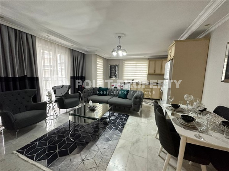 Modern three-room apartment 115 m² by the sea in one of the Oba complexes, Alanya-id-3167-photo-1
