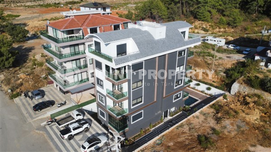 New 2+1 apartment in a building in 2022, upper Oba Alanya district, with two bathrooms-id-3173-photo-1