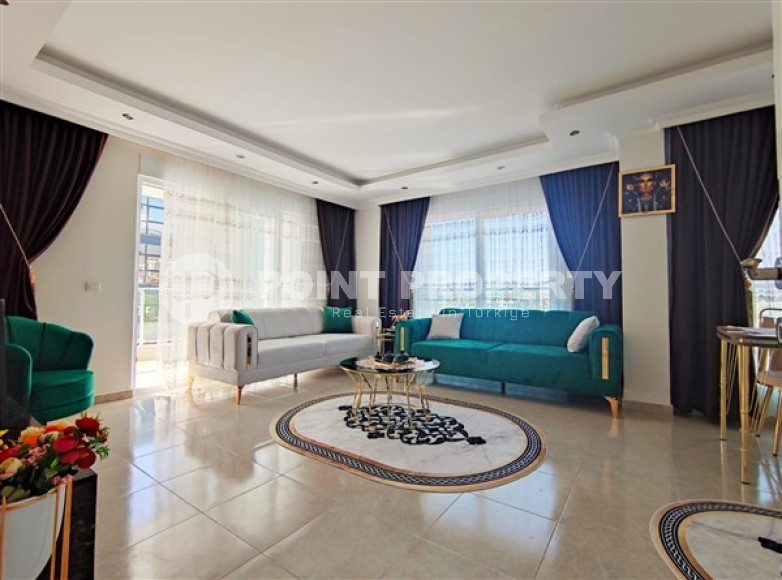 Two-room apartment 65 m² overlooking the ruins of an ancient castle in Mahmutlar, Alanya-id-3192-photo-1