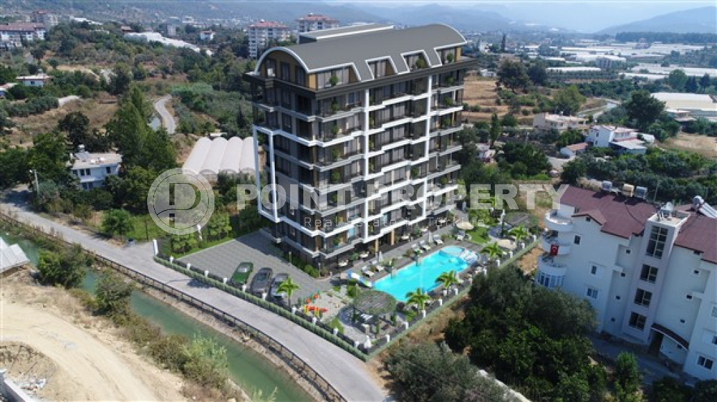 Duplexes with roof access and 1+1 apartments in a new project in Avsallar, Alanya-id-3199-photo-1