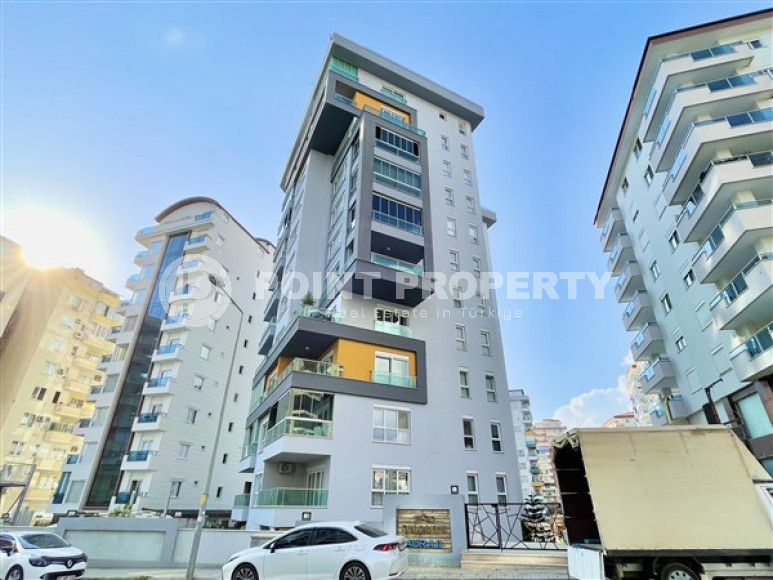 Classic 1+1 apartment in a high-rise building in Mahmutlar, Alanya-id-3217-photo-1