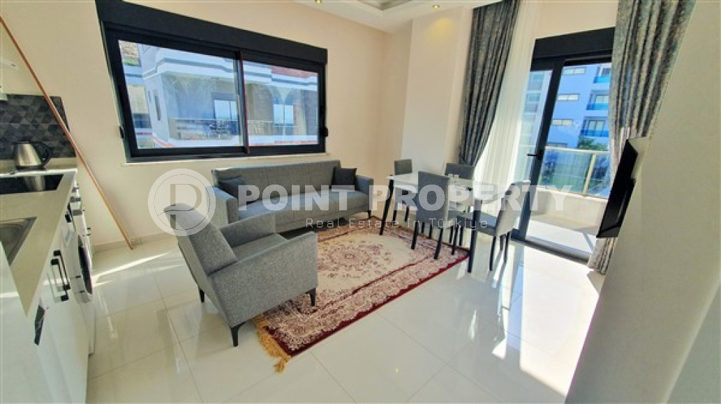 Lovely furnished 1+1 apartment in a new building, Kargicak, Alanya-id-3223-photo-1