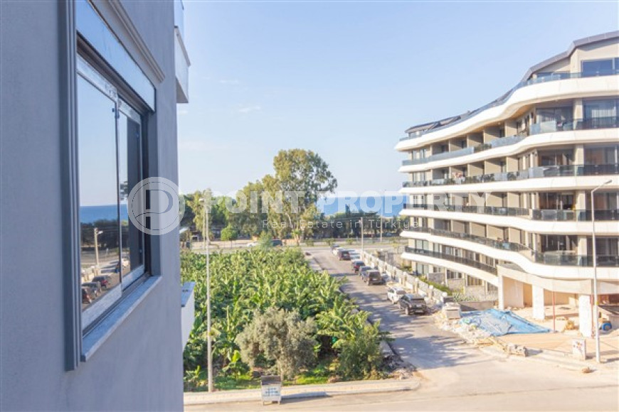 One bedroom apartment in a new complex 150 meters from the sea, Kargicak, Alanya-id-3243-photo-1