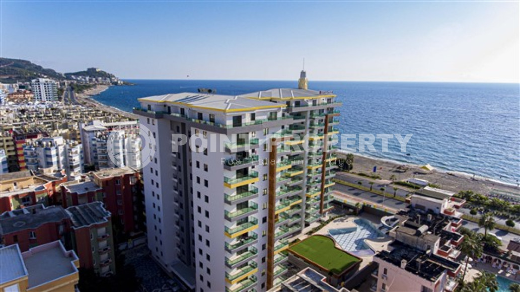 Stylish two-bedroom apartment in a residential complex on the first line, Mahmutlar, Alanya-id-3245-photo-1