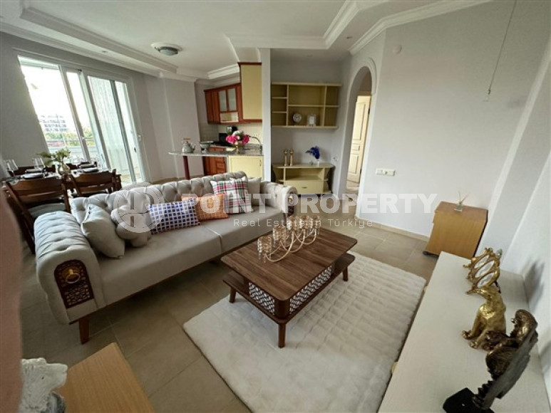 Small apartment with an area of 55 m2 five hundred meters from the sea, Tosmur district, Alanya-id-3250-photo-1