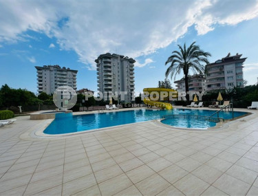 Two-room apartment with an area of 60 m2 in the Cikcilli area, Alanya, on the ninth floor of the building-id-3255-photo-1