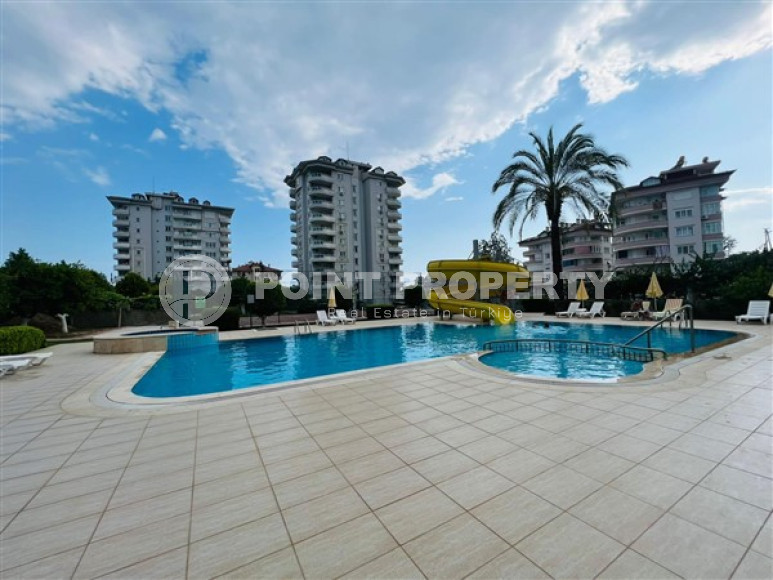 Two-room apartment with an area of 60 m2 in the Cikcilli area, Alanya, on the ninth floor of the building-id-3255-photo-1