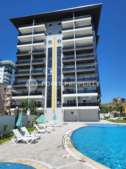 Family apartment with three bedrooms in a new building 300 meters from the sea, Mahmutlar, Alanya-id-3282-photo-1