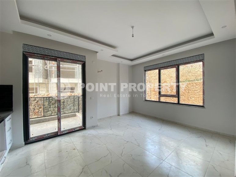 Compact one-bedroom apartment of 48 m², unfurnished, Upper Oba, Alanya-id-3294-photo-1