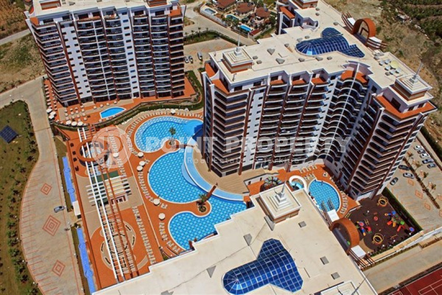 Шикарная четырёхкомнатная квартира площадью 145 м² в комплексе отельного типа, Махмутлар, Аланья-id-3362-фото-1