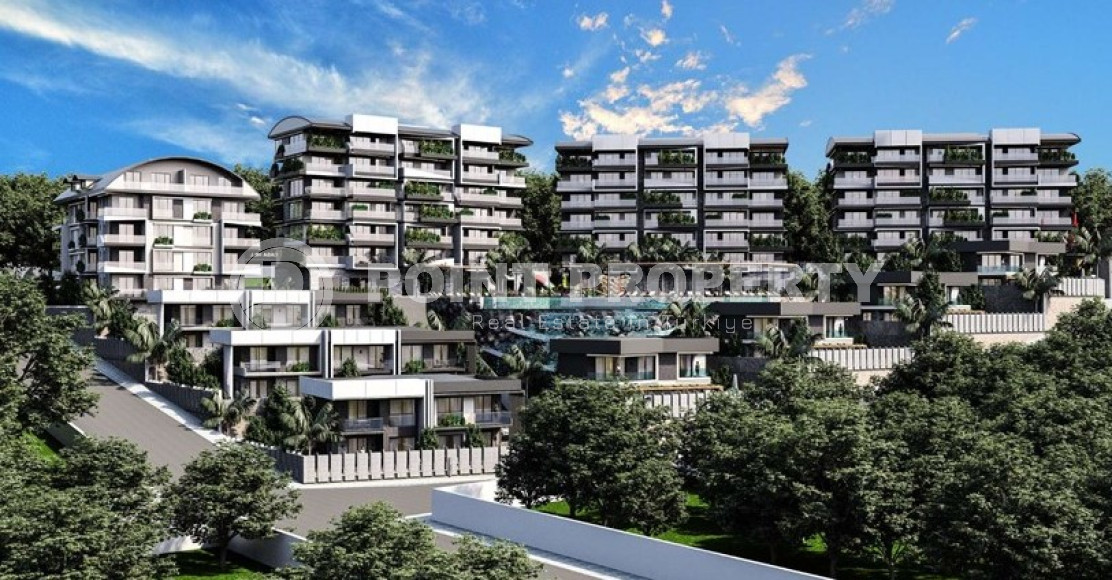 Новый крупный проект с квартирами и виллами от 63 до 425 м2, с видом на море в районе Каргыджак.-id-1301-фото-1
