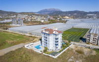 Изысканная двухкомнатная квартира 60 м2 в районе Демирташ, в 50 метрах от моря-id-3436-фото-16