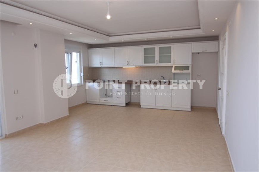 Spacious apartment with an area of 115 m2 250 meters from the sea, Mahmutlar district-id-3456-photo-1