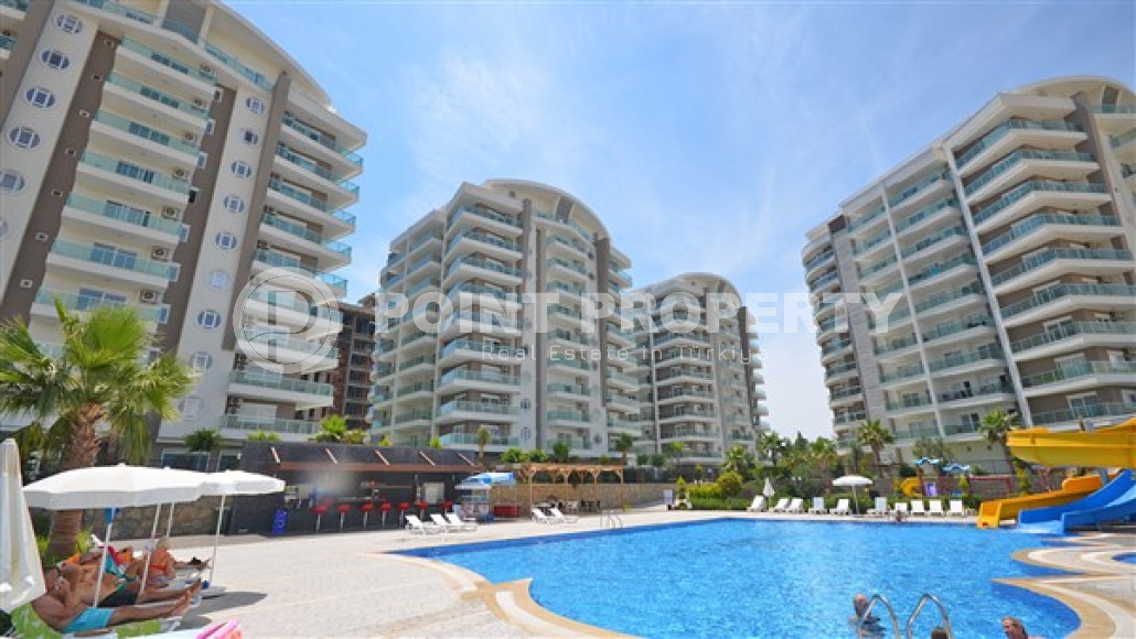 Inexpensive furnished studio with an area of 45 m2 and two swimming pools, Avsallar district-id-3471-photo-1