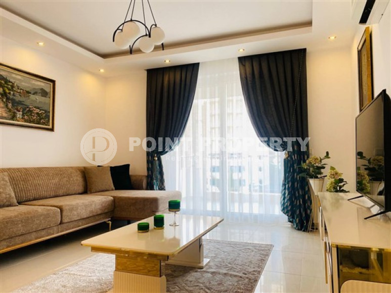 Современные апартаменты 1+1 с площадью 65 м2 в районе Махмутлар, с мебелью-id-3473-фото-1