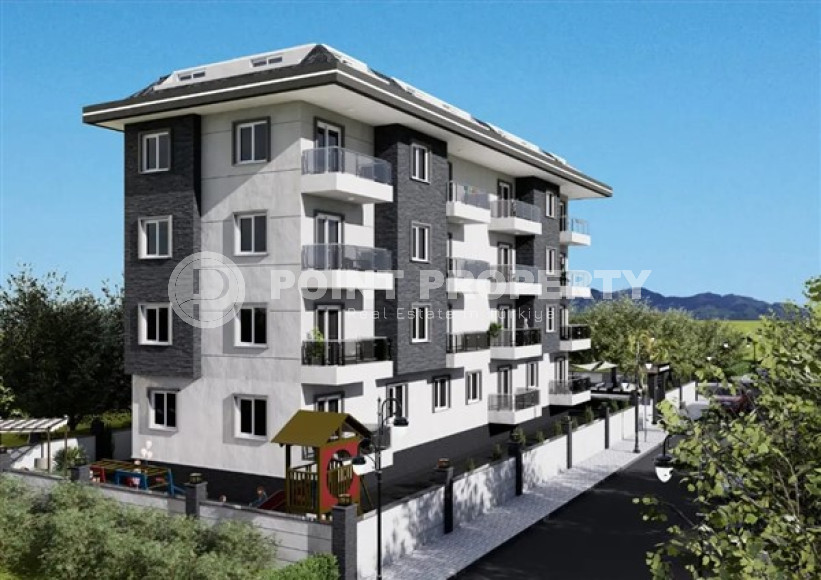 Апартаменты в недорогой ценовой категории с площадью 55 - 140 м2, район Окурджалар, в новом комплексе-id-3477-фото-1