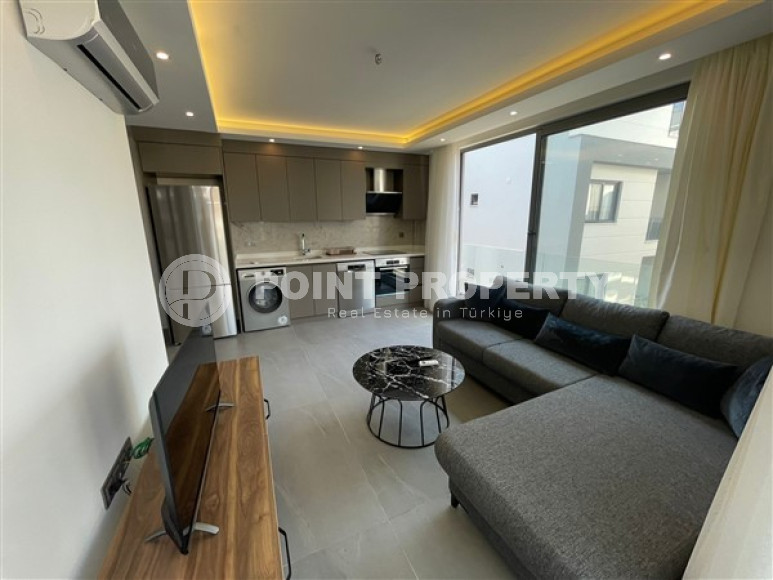 Charming one bedroom apartment in the center of Alanya, with an area of 55 m2-id-3490-photo-1