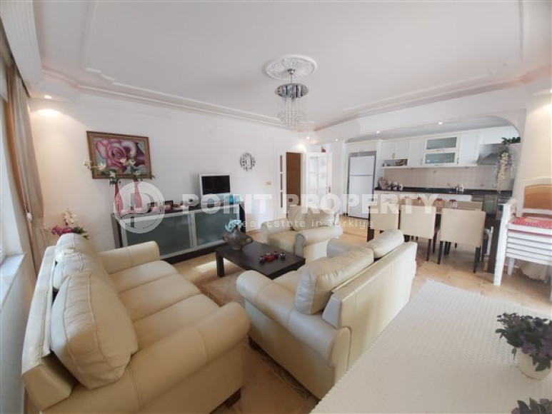 A versatile, good-quality apartment (2+1) in the center of Mahmutlar, just 400 meters from the sea.-id-3509-photo-1