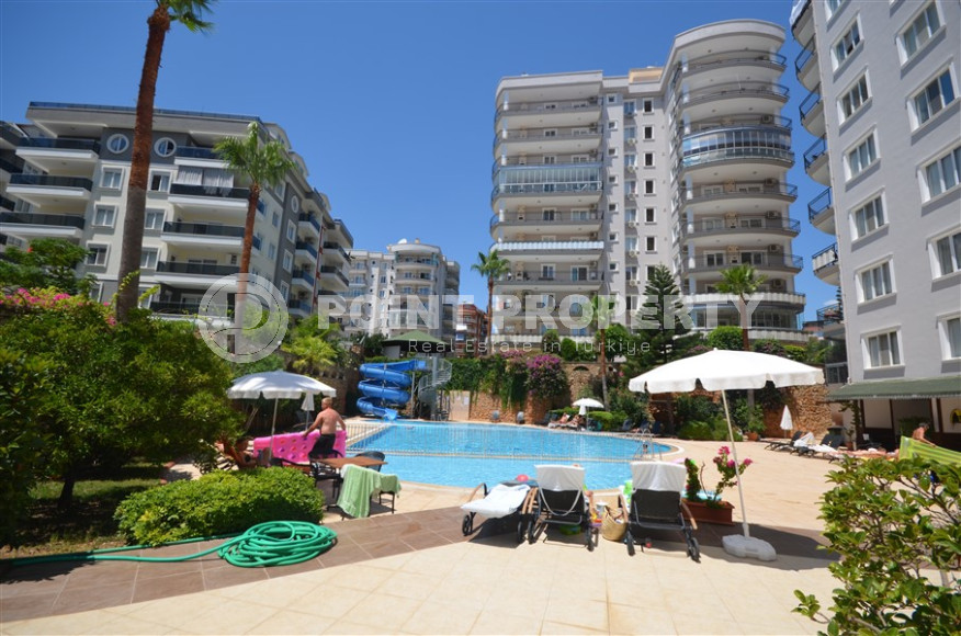 Spacious apartment with a 2+1 layout and an area of 117 m2 in a complex with a private pool and garden in the Tosmur area, 700 meters from the sea-id-1311-photo-1