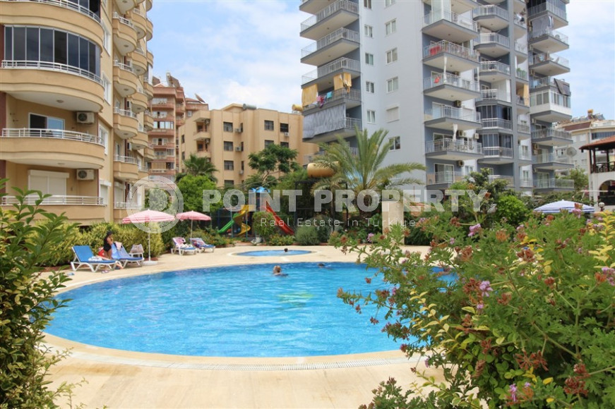 Spacious apartment with a 2+1 layout and an area of 120 m2 in a complex with a private pool and garden in the Tosmur area, 400 meters from the sea-id-1312-photo-1