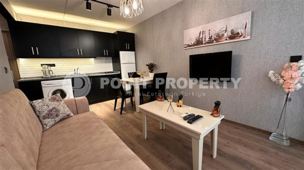 Cozy apartment 65 m2 in a building built in 2005, Oba district, Alanya, furnished-id-3564-photo-1