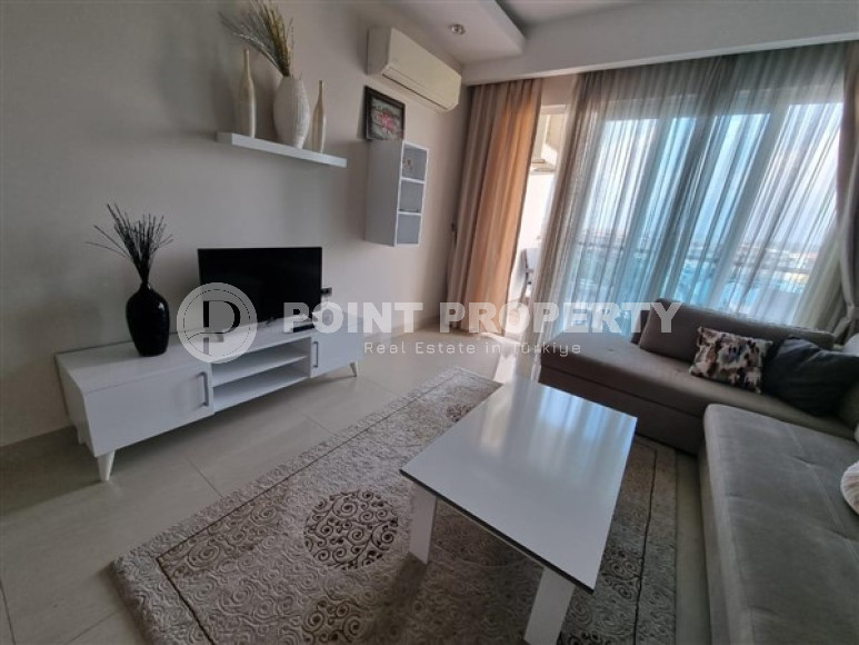 Spacious 1+1 apartment in the center of Mahmutlar, 250 meters from the sea.-id-3578-photo-1