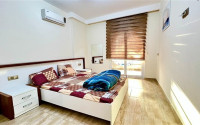 Компактная светлая квартира 1+1 в 300 метрах от  центра района Махмутлар.-id-3640-фото-6