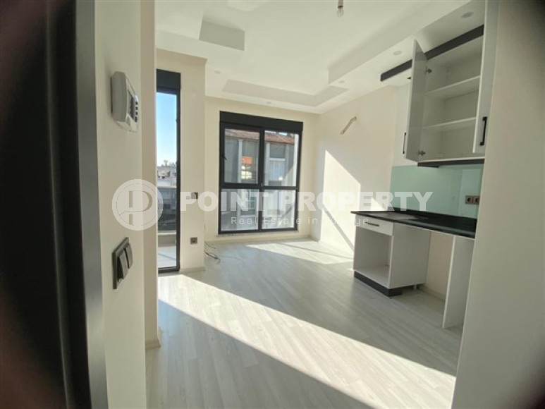 Compact 1+1 apartment with an area of 50 m2 located 100 meters from the center of Alanya-id-3648-photo-1