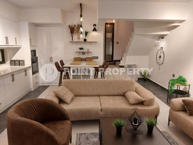 Stylish designer three-bedroom apartment, 140m², in a townhouse in Alanya Kargicak-id-1319-photo-1