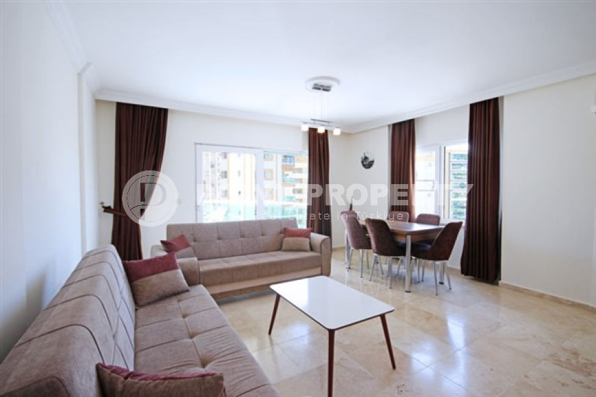 Bright furnished apartment 2+1 with an area of 100 m2 in the Mahmutlar area-id-3676-photo-1