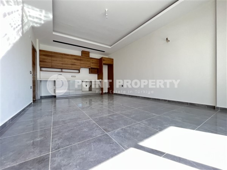 New 2+1 apartment with an area of 125 m2 in a residence built in 2021, Mahmutlar-id-3691-photo-1