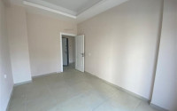 Квартира с двумя спальнями, 80м², в новой резиденции с инфраструктурой в районе Джикджилли, Аланья-id-2140-фото-2