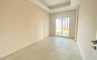 Квартира с двумя спальнями, 80м², в новой резиденции с инфраструктурой в районе Джикджилли, Аланья-id-2140-фото-5