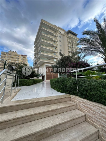 Two-room apartment on a high floor in Mahmutlar, fully equipped with furniture and appliances, 65 m2.-id-3707-photo-1