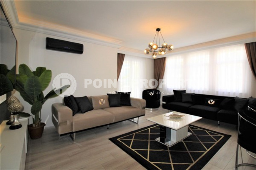 Stylish 2+1 apartment in the center of Mahmutlar and 200 meters from the beach.-id-3736-photo-1