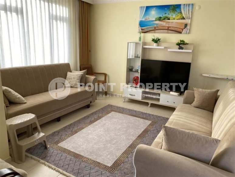 Spacious 2+1 apartment on the 9th floor in the center of Mahmutlar.-id-3741-photo-1
