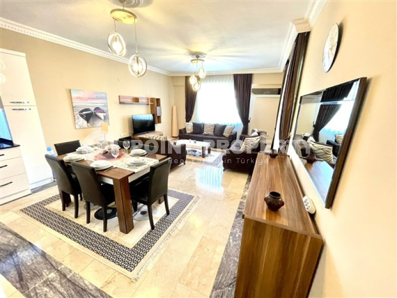Three-room apartment with furniture with an area of 110 m2 in Alanya, Oba-id-3777-photo-1
