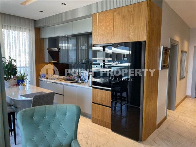 Apartment 2+1 with luxurious sea views in the prestigious area of Alanya Kargicak.-id-3806-photo-1