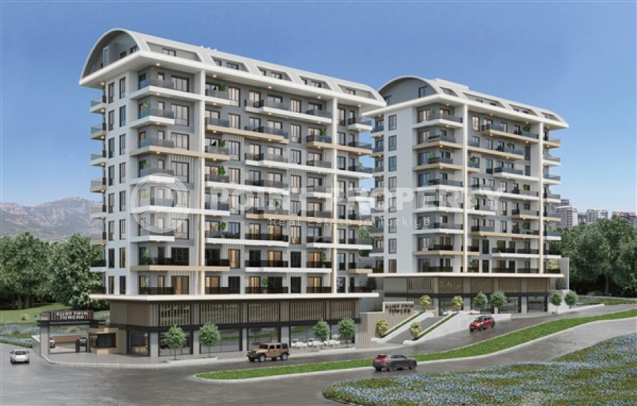 Апартаменты планировок 1+1, 2+1, 3+1 в строящемся комплексе в Махмутларе, 850 м к морю-id-1042-фото-1
