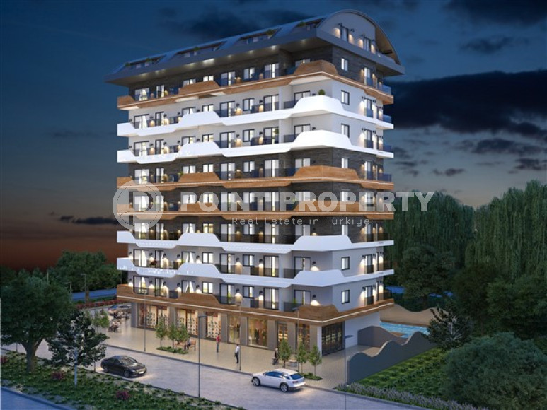 Inexpensive 1+1 apartment for sale with an area of 55 m2 at the stage of construction work, Mahmutlar district-id-3813-photo-1