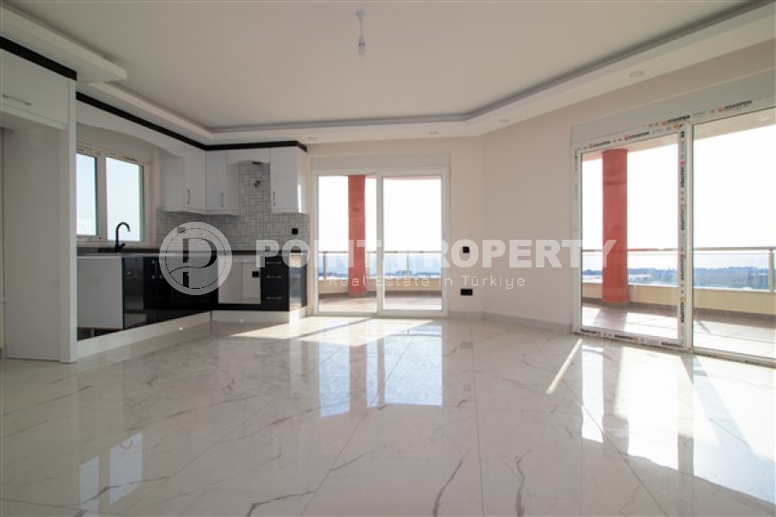 Spacious two-level apartment on the 9th floor with an attic with panoramic sea views.-id-3845-photo-1