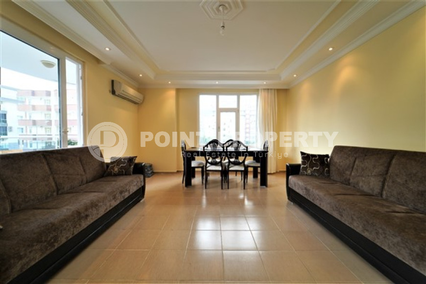 Furnished apartment 2+1, with a total area of 120 m2, on the 4th floor in the center of Mahmutlar.-id-3863-photo-1