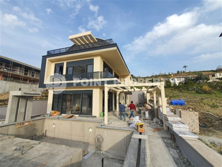 New luxury villa with an area of 440 m2 at the stage of completion of construction works, Kargicak area-id-3871-photo-1