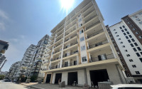 Четыре уютные двухкомнатные квартиры планировкой 1+1 и площадью 60 м2 в новом комплексе в Махмутларе, в 400 метрах от моря-id-1328-фото-2