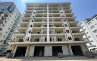 Четыре уютные двухкомнатные квартиры планировкой 1+1 и площадью 60 м2 в новом комплексе в Махмутларе, в 400 метрах от моря-id-1328-фото-6