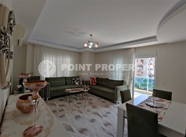 Apartment 2+1, with a total area of 110 m2, in the center of Mahmutlar.-id-3884-photo-1