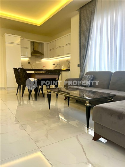 Beautiful bright 1+1 apartment with modern design and good renovation, 500 meters from the sea.-id-3942-photo-1