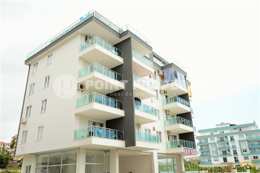 Bright and comfortable 1+1 apartment with an area of 60 m2 in a low-rise complex in Mahmutlar district-id-3976-photo-1