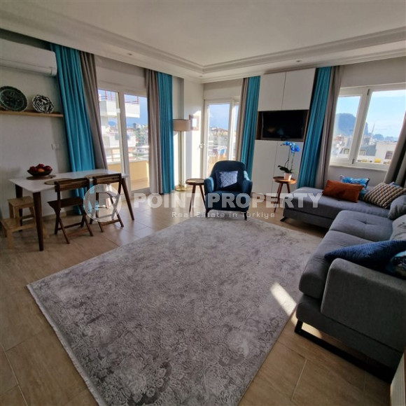 Well-maintained three-room apartment 110 m2, Alanya center. 700 meters from the Mediterranean coast.-id-3979-photo-1