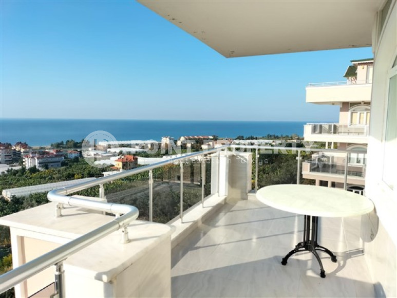 Large duplex on the 4th floor with attic with luxurious panoramic sea views in the quiet Demirtas area.-id-4007-photo-1